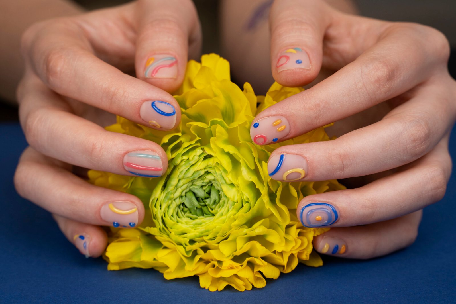 Close Up Hands With Yellow Flower